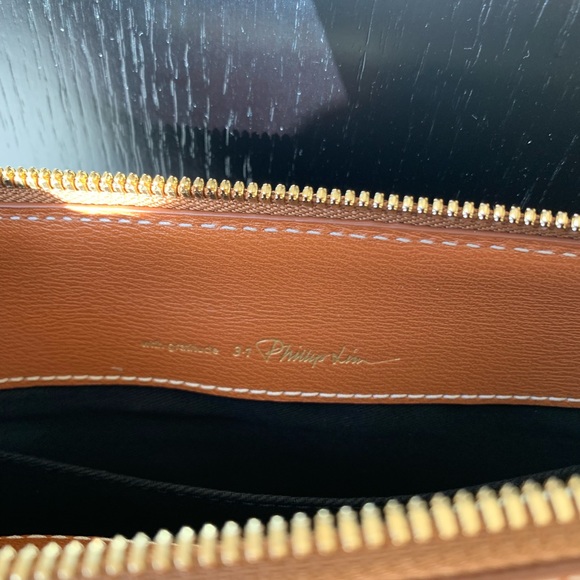 NWT Phillip Lim Pashli Clutch. Brand new with authenticity card. - Picture 8 of 10